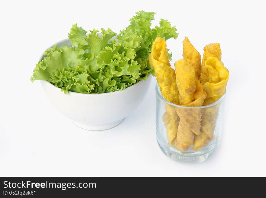 Thai Fried Wonton and salad leaves on white background. Thai Fried Wonton and salad leaves on white background