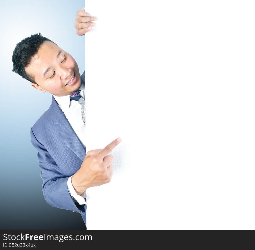 Business man holding white board template