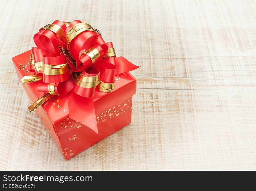 Rich beautiful gift with a red bow. Rich beautiful gift with a red bow.