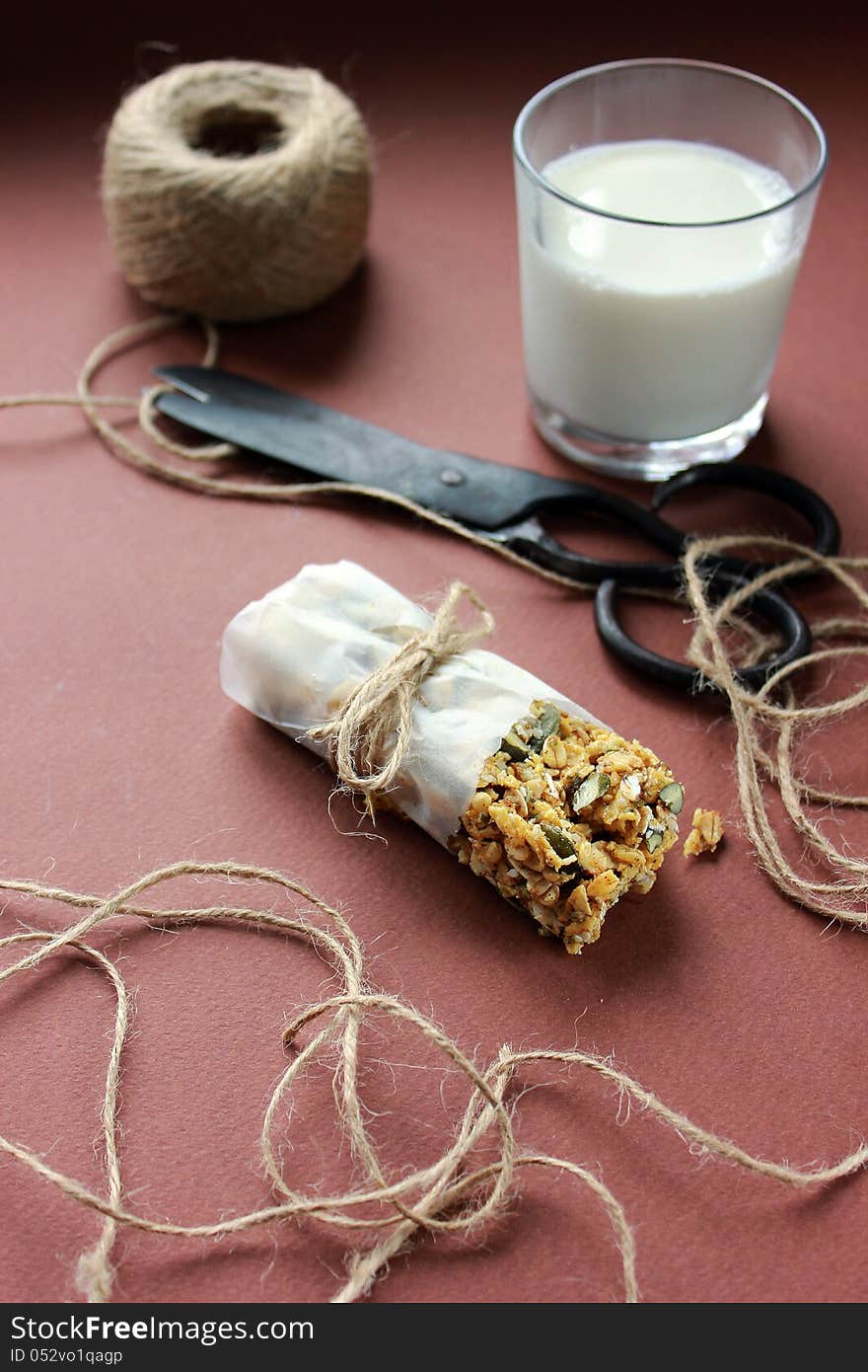 Full grain bars with berries and cup of milk. Full grain bars with berries and cup of milk