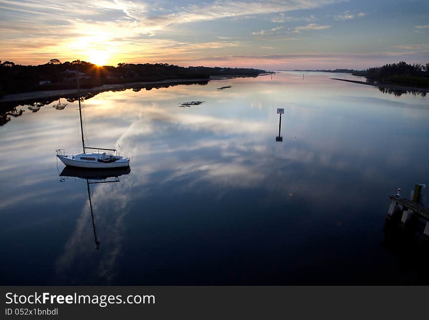 Sunrise with sailboat