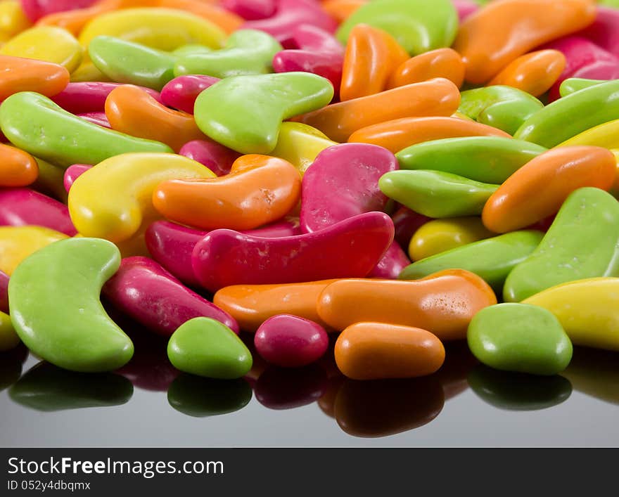 Sweet candies a variety colors placed on background. Sweet candies a variety colors placed on background