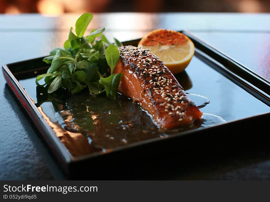 Chinese food on oriental plate.