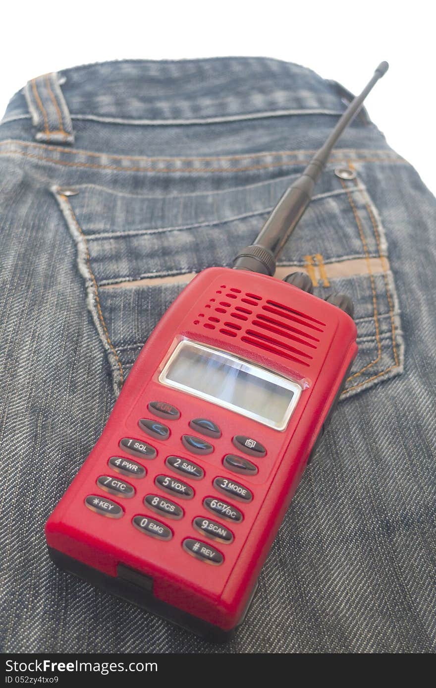 Red radio communication on jean background