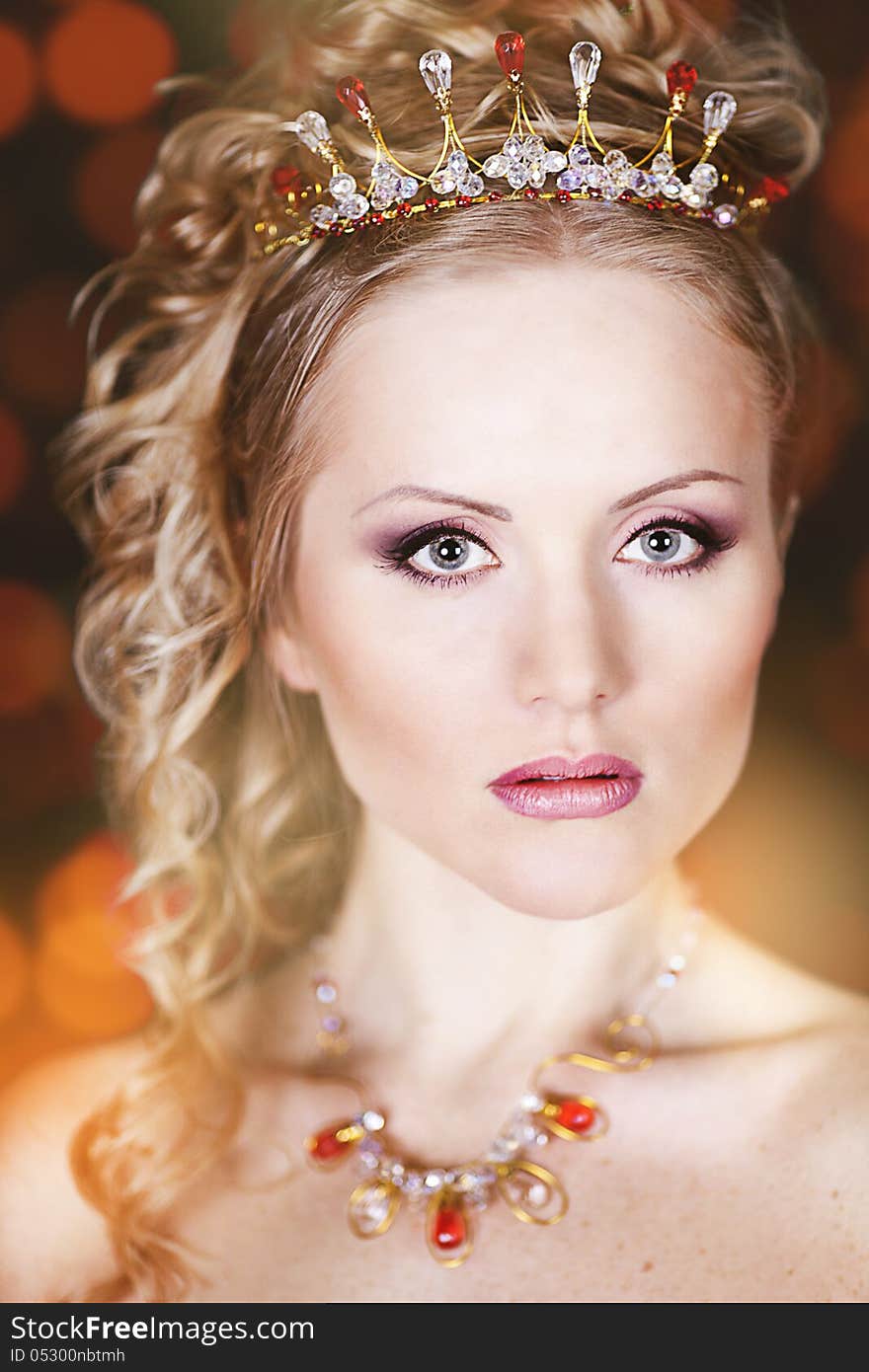 Portrait of a beautiful young bride in a white dress