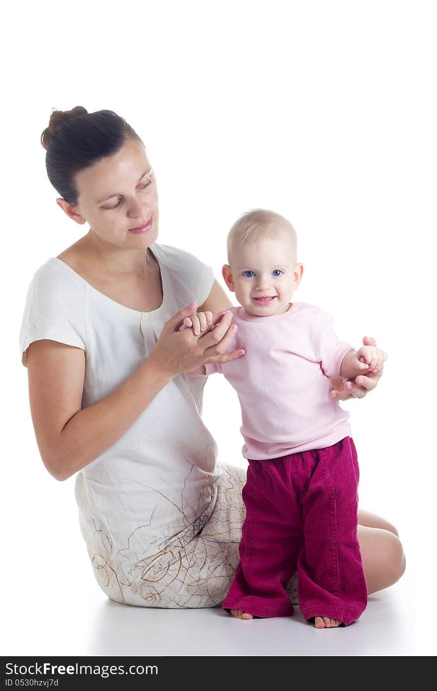 Mother holding cute baby girl. Mother holding cute baby girl