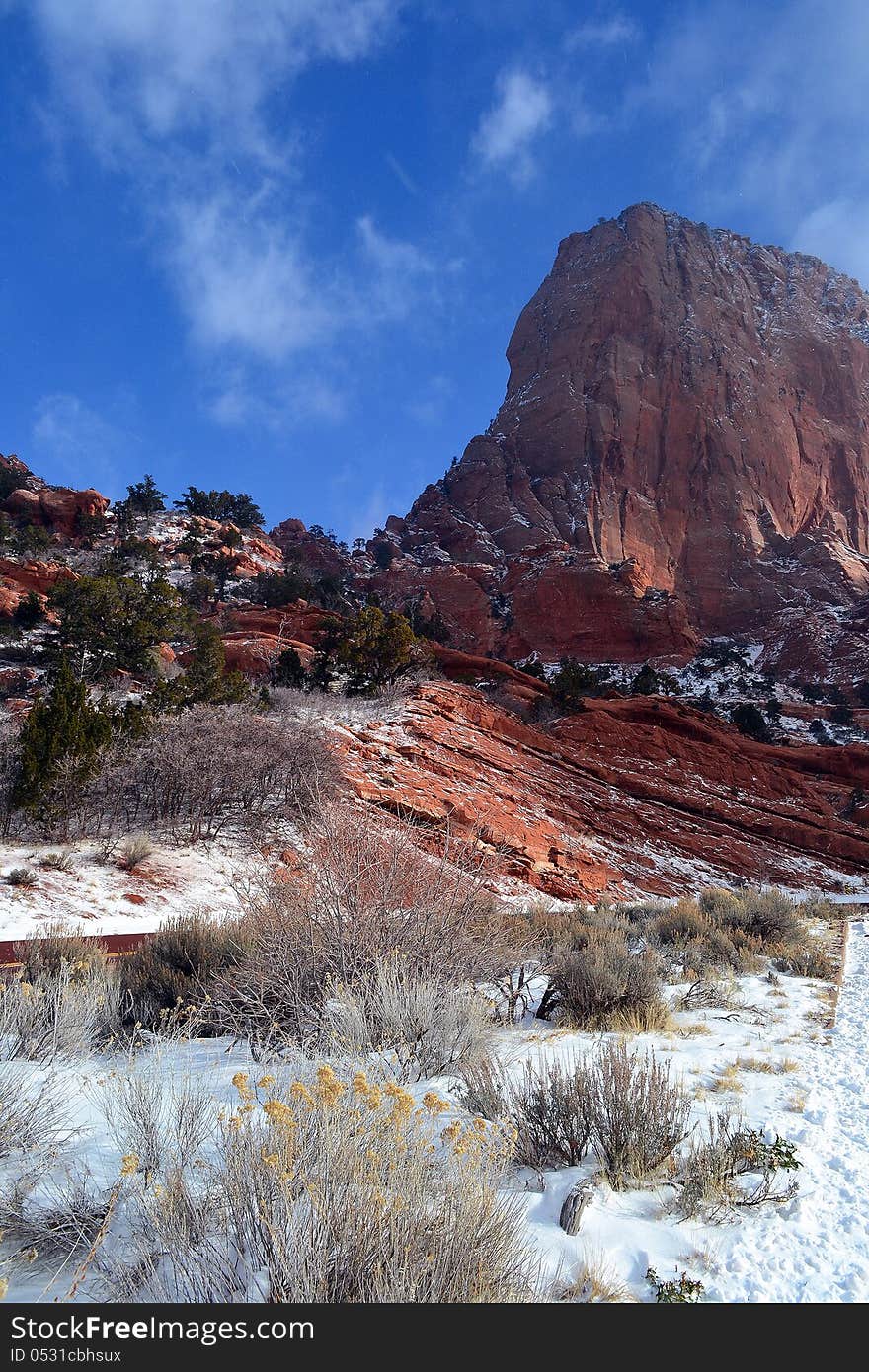 A winter scene of snow and red rocks in Utah. A winter scene of snow and red rocks in Utah.