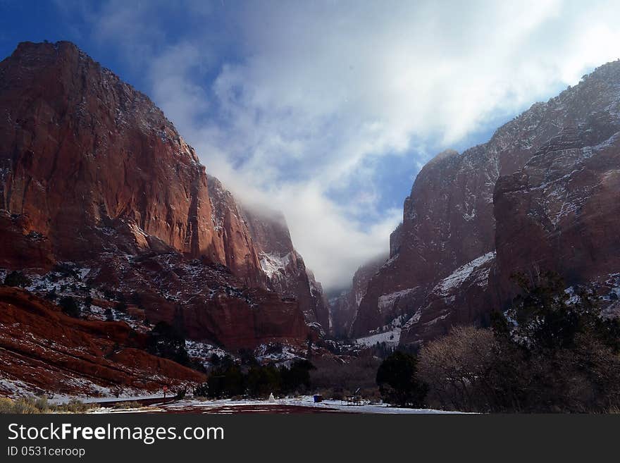 A winter scene of snow and red rocks in Utah. A winter scene of snow and red rocks in Utah.