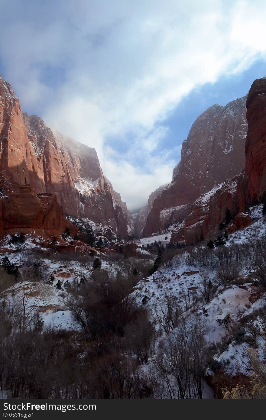 A winter scene of snow and red rocks in Utah. A winter scene of snow and red rocks in Utah.