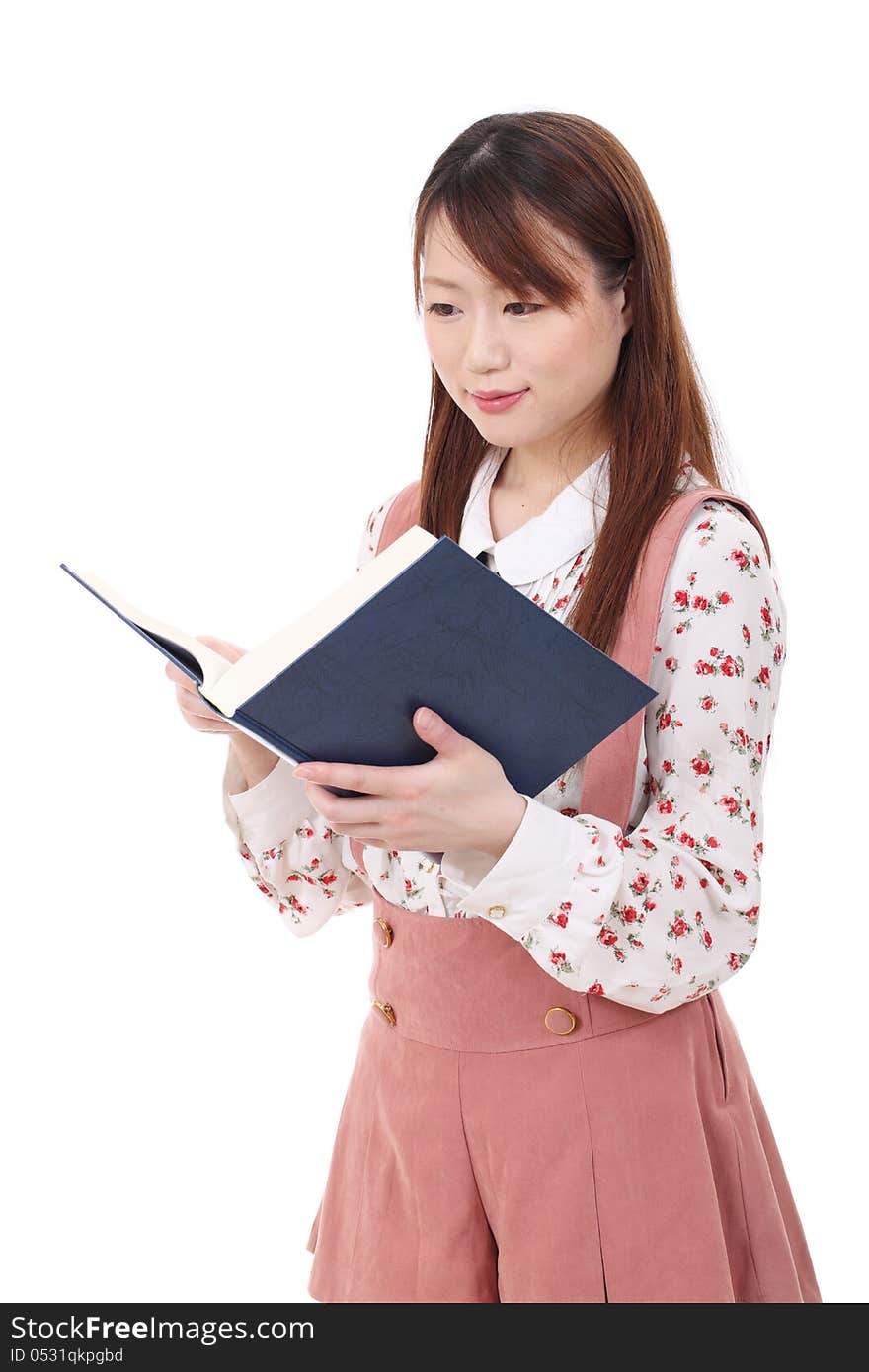 Portrait of young asian woman reading book isolated on white background