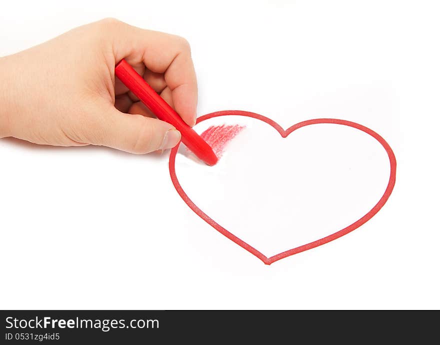 The man's hand draws chalk red heart. The man's hand draws chalk red heart