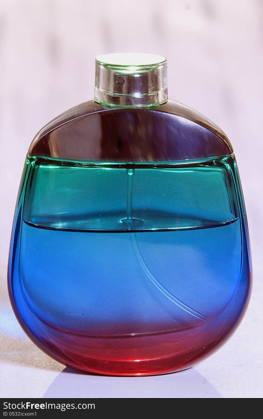 Perfume on  background with reflection