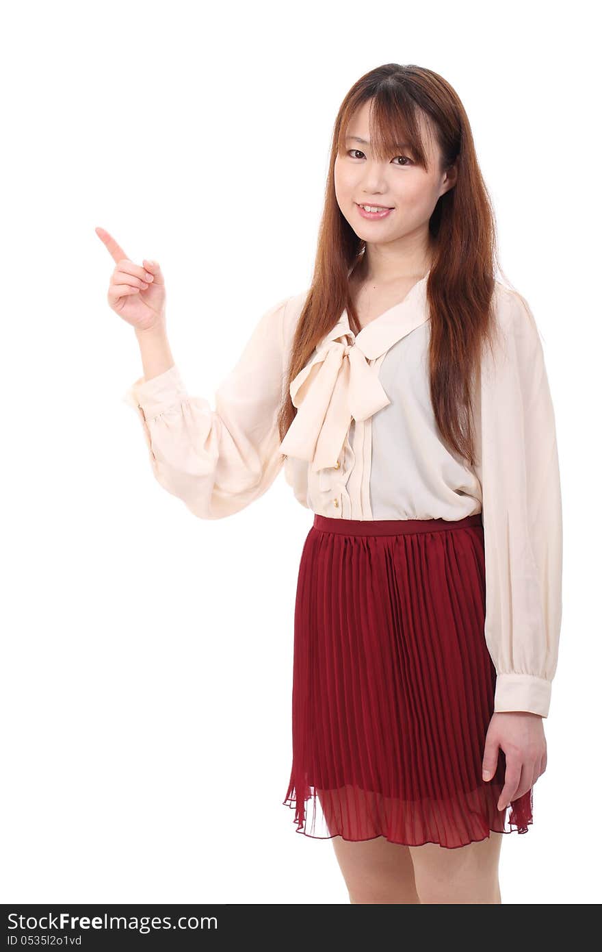 Portrait of young asian woman pointing up　