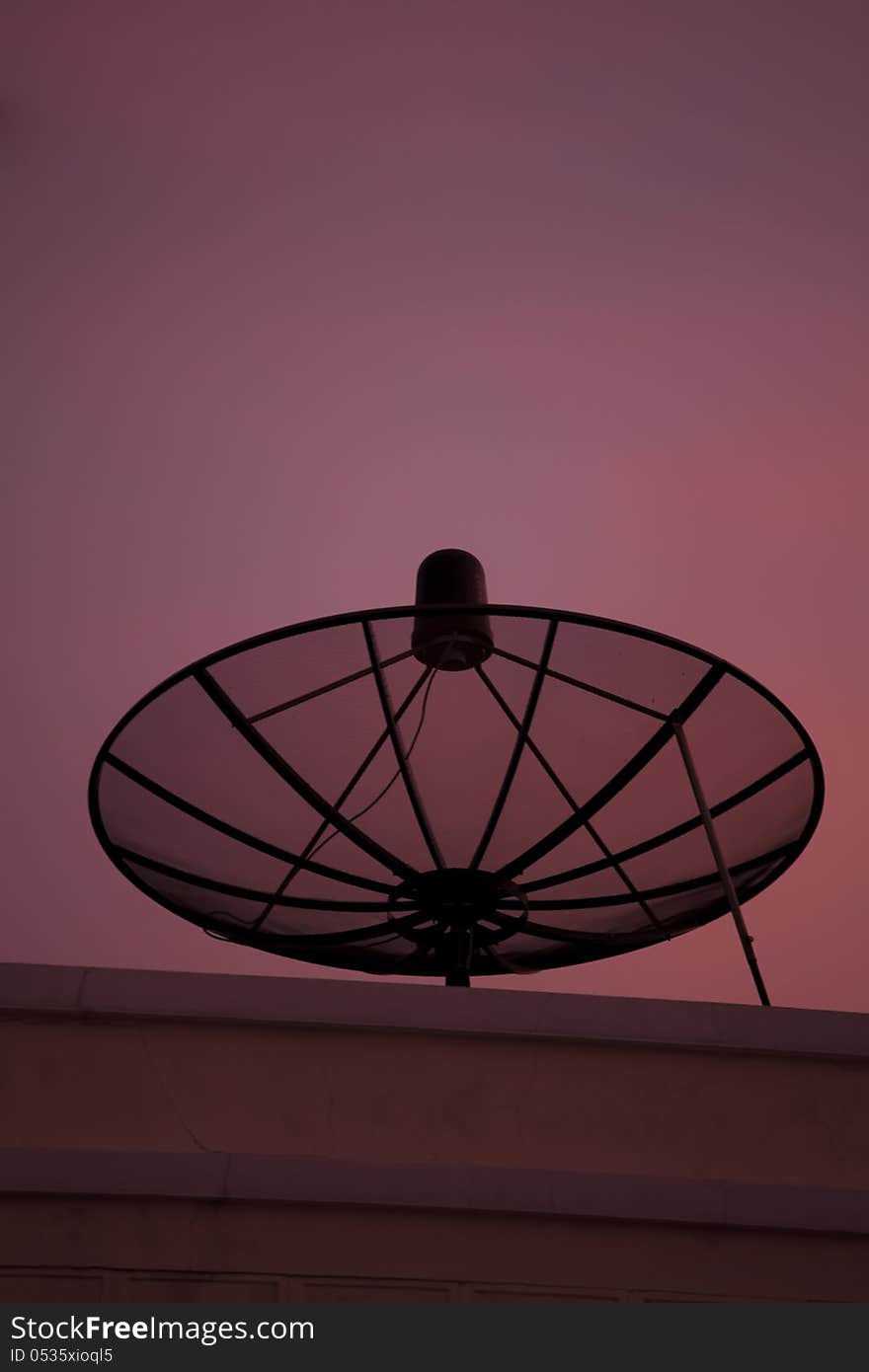 Satellite dish at sunset