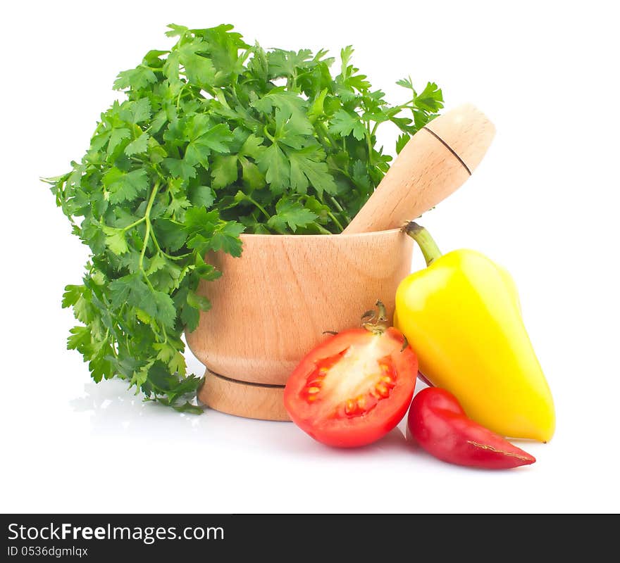 Wooden mortar with parsley, tomato and pepper, food ingredient photo. Wooden mortar with parsley, tomato and pepper, food ingredient photo