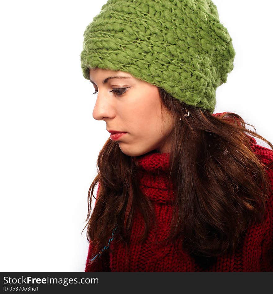 Attractive young caucasian woman in red sweater on white background. Attractive young caucasian woman in red sweater on white background