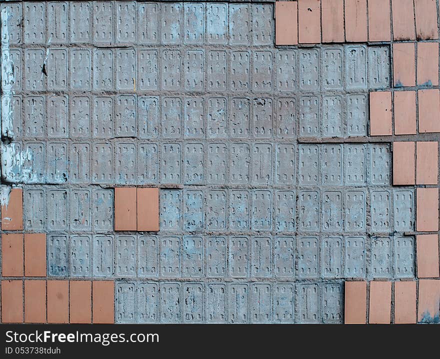 A photography of a seamless stone tiles wall. A photography of a seamless stone tiles wall