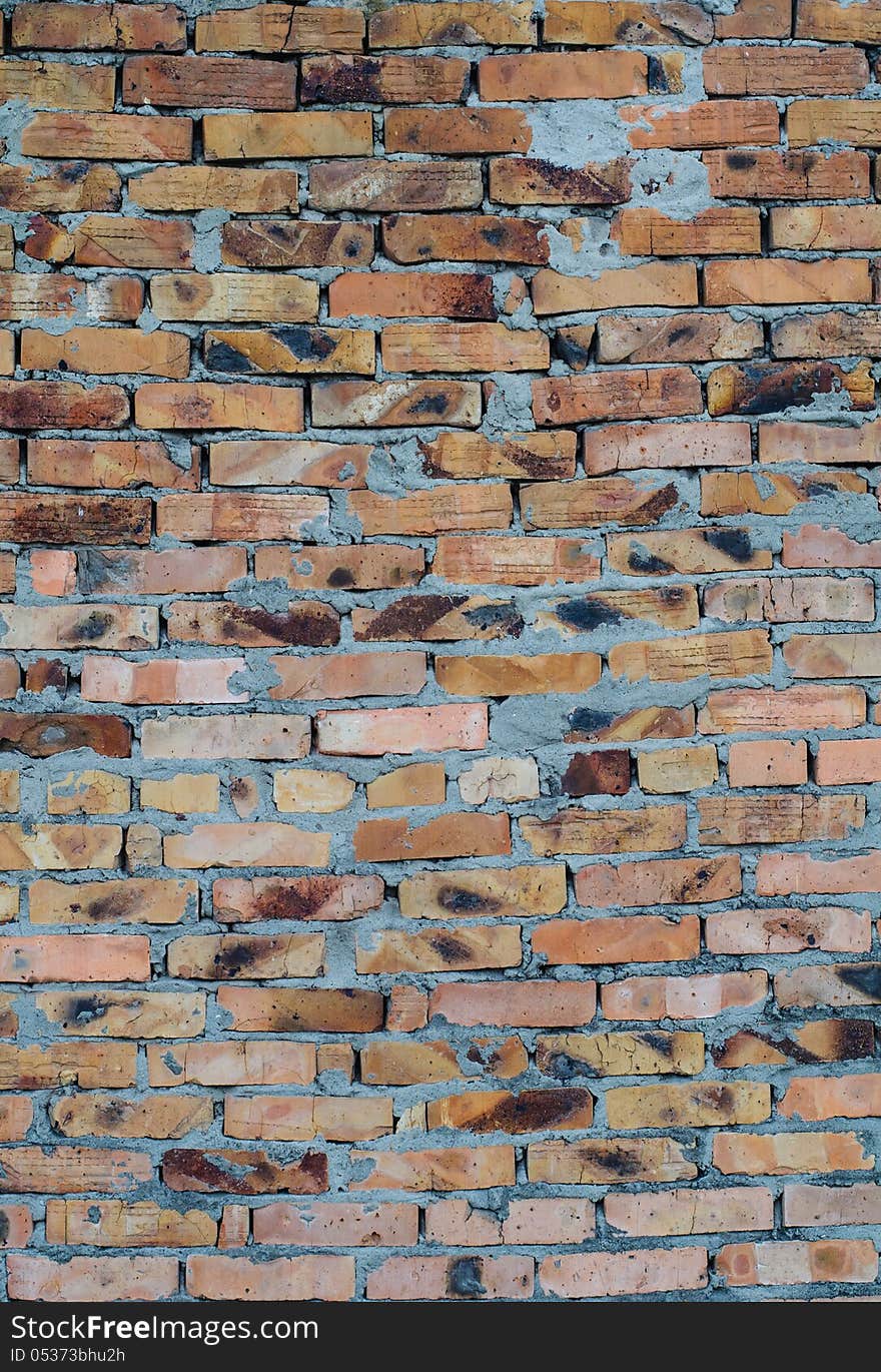 Aged brick wall background. High resolution texture