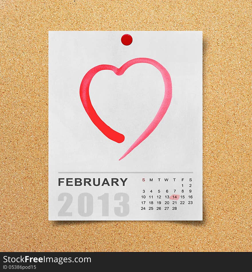 Calendar 2013 and red heart on note paper.