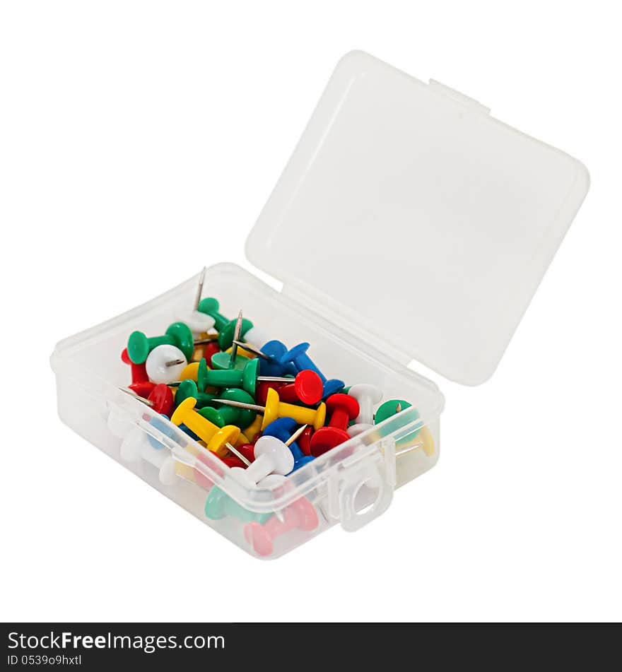 transparent plastic box with thumbtacks isolated on white background