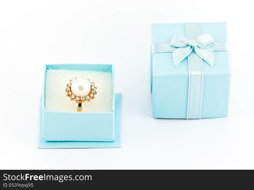 Wedding ring in the blue gift box. Wedding ring in the blue gift box.