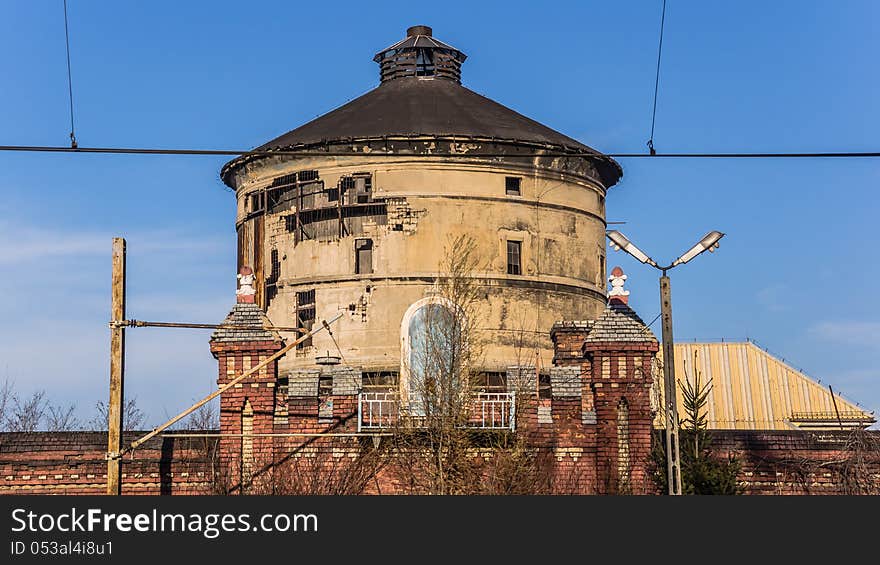 Old devastated locomotive shed with empty shrine in the center, Katowice, Silesia region, Poland. Old devastated locomotive shed with empty shrine in the center, Katowice, Silesia region, Poland