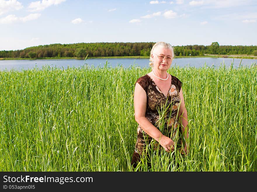 Closeup portrait of a smiling elderly woman. See my other works in portfolio.