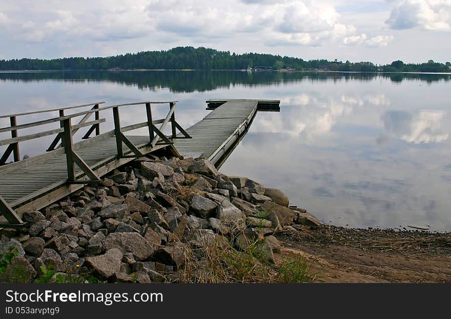 Empty dock in calm lake. Empty dock in calm lake