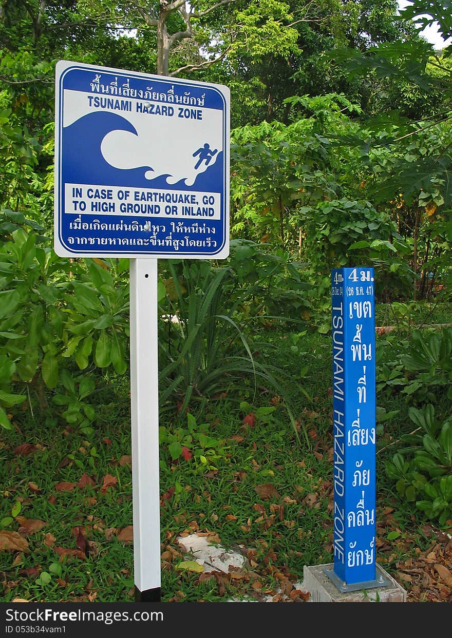 Sign board in Thailand showing instructions in case of tsunami. Sign board in Thailand showing instructions in case of tsunami