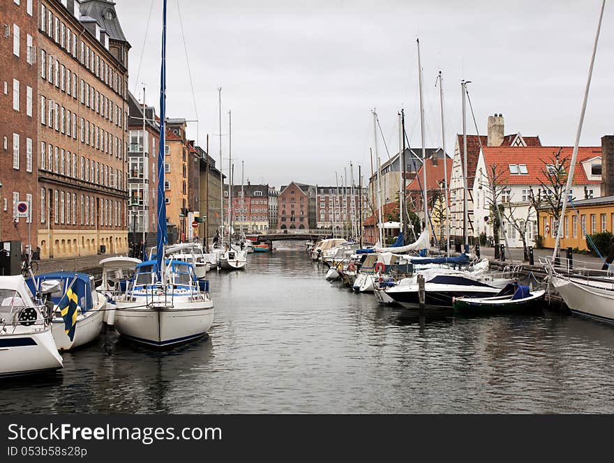 Denmark, May 19, 2012. Christianshavn Canal in Copenhagen is noted for its bustling sailing community with numerous sailboats and houseboats, May 19, 2012.