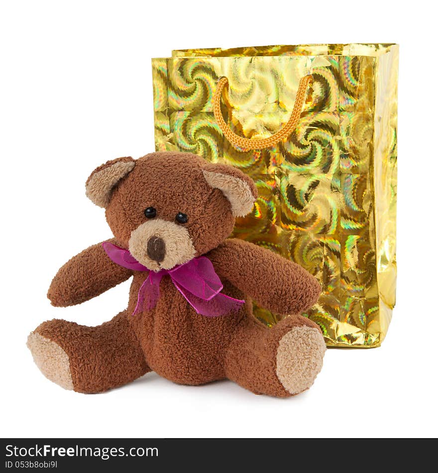 Teddy bear with a cardboard gift box