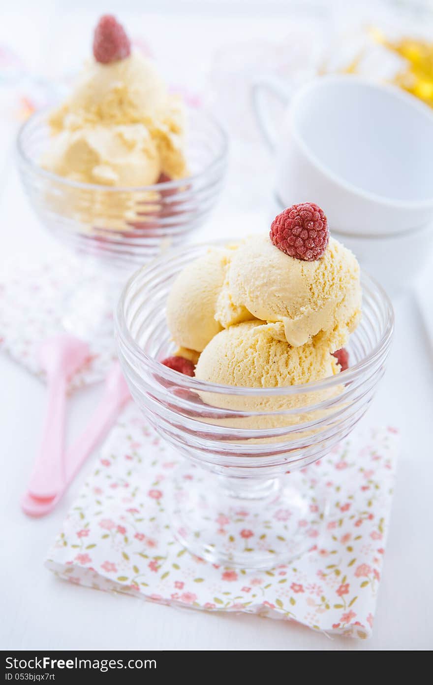 Delicious vanilla ice cream with raspberries