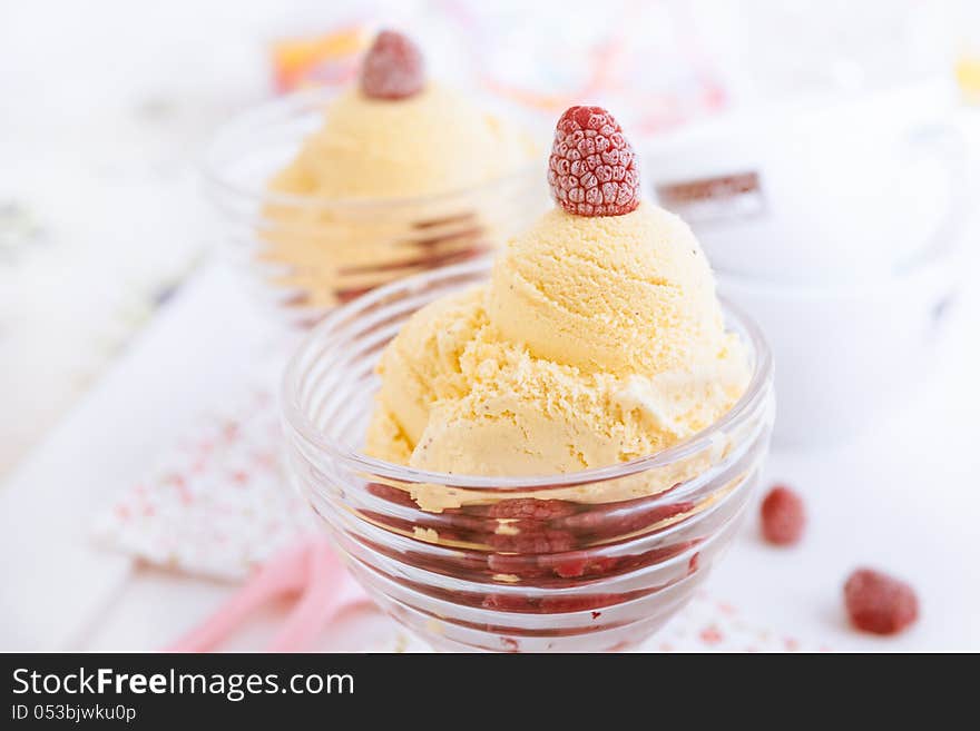 Delicious vanilla ice cream with raspberries