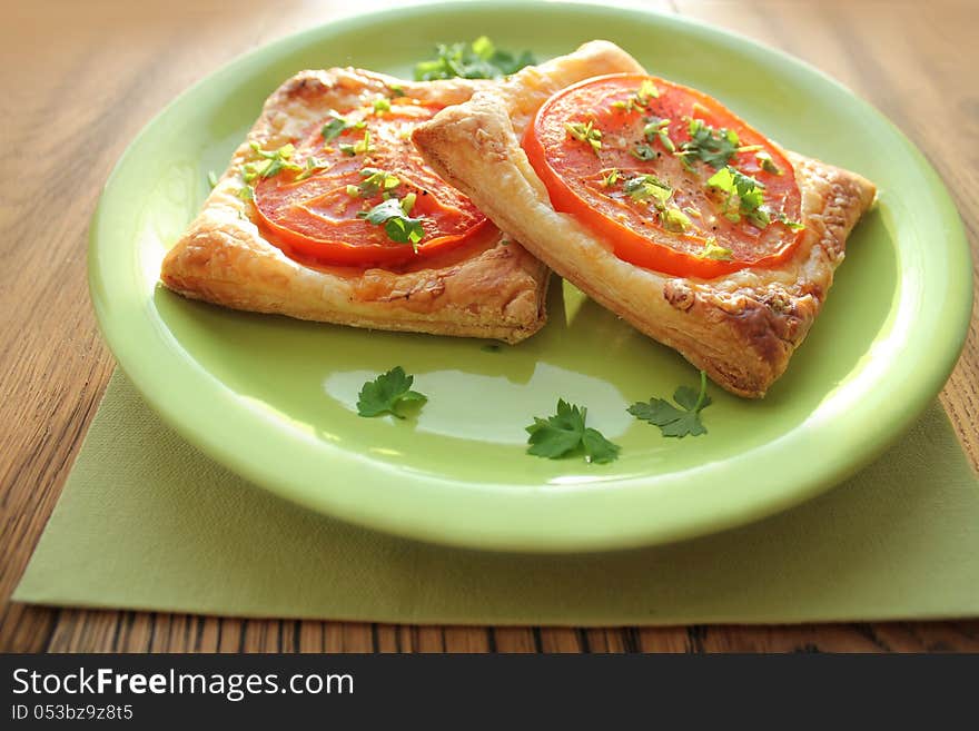 puff pastry with tomatoes ( close up )