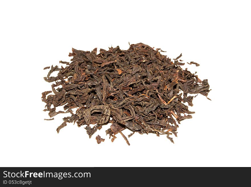 Handful of black tea leaves on white background