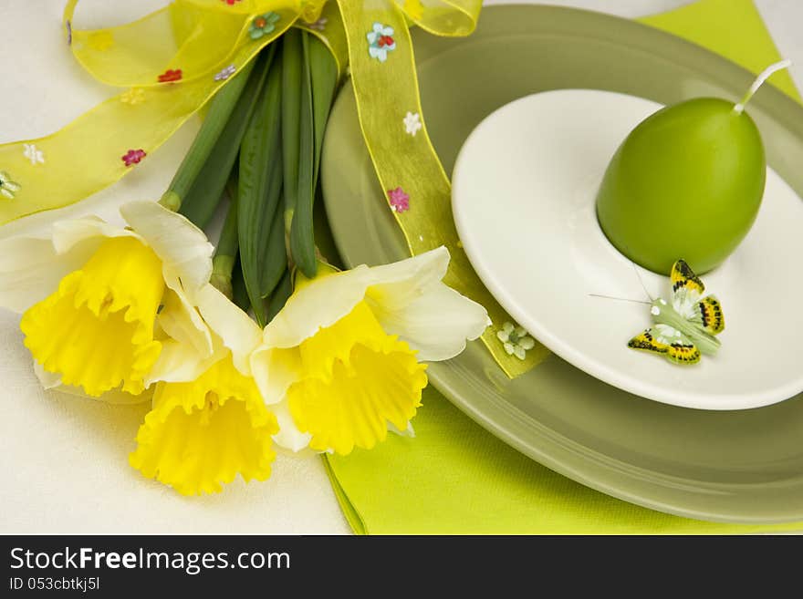 Easter still life with spring flowers and plate for eggs. Easter still life with spring flowers and plate for eggs