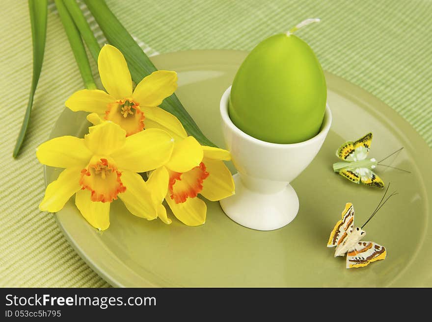 Easter composition with flowers and plate for eggs. Easter composition with flowers and plate for eggs