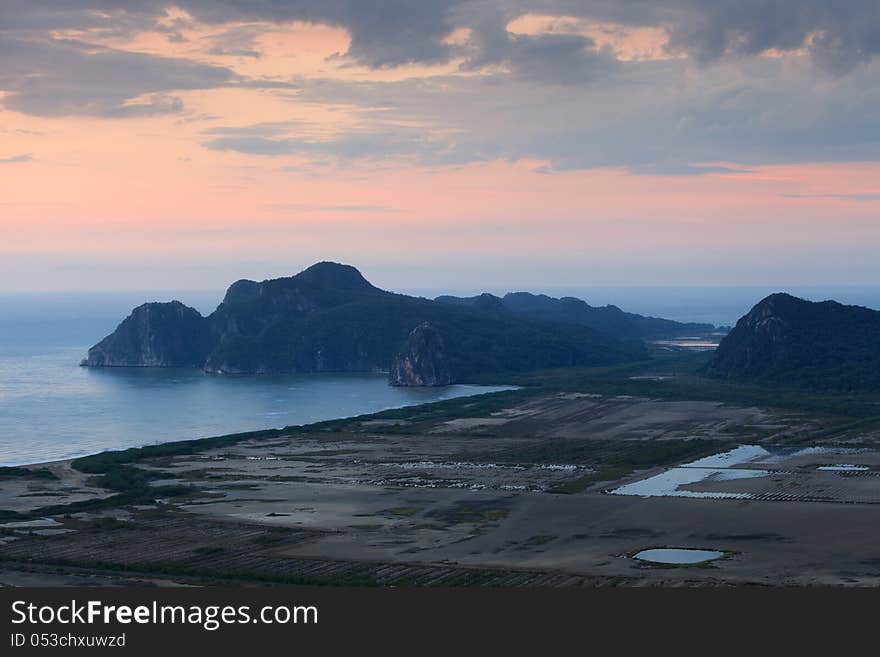 Sunrise and mountain beside the sea