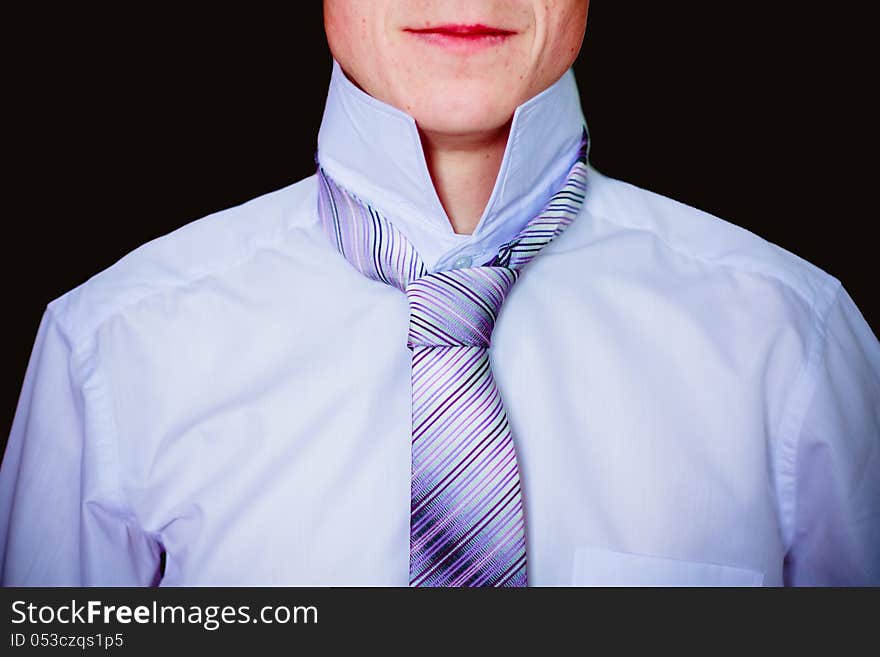 Man Tying His Tie