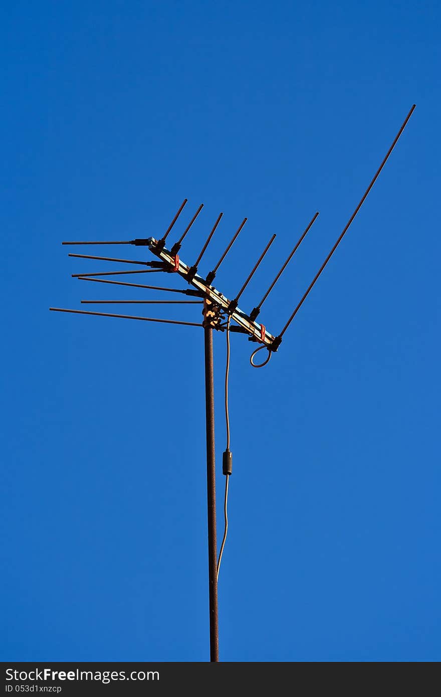 Old antenna with blue sky