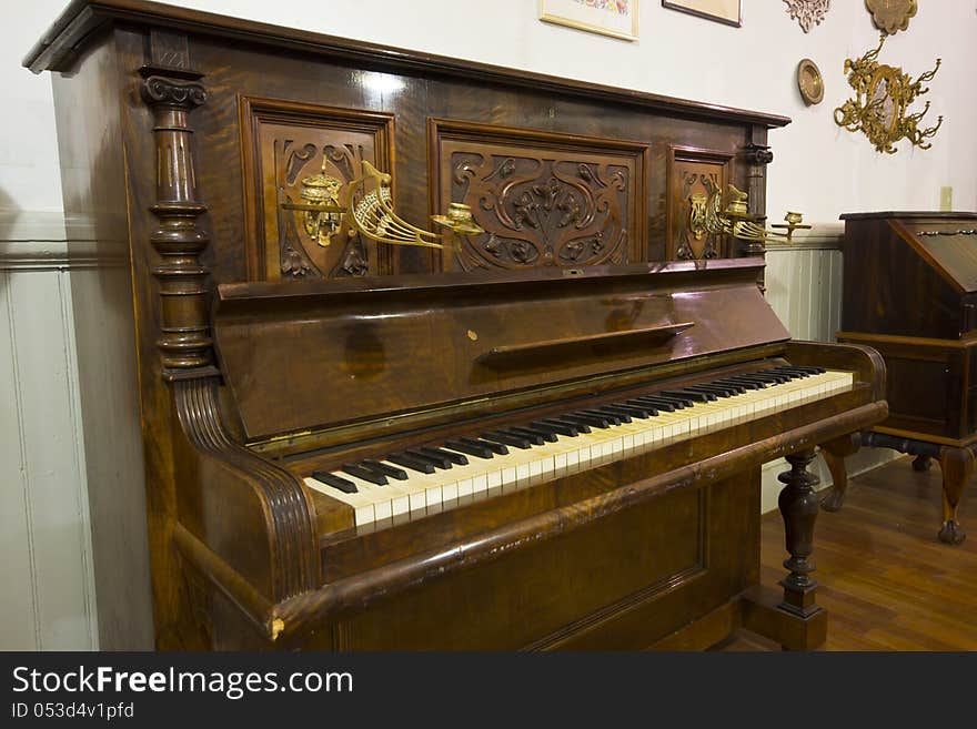 Antique piano with detailed carving