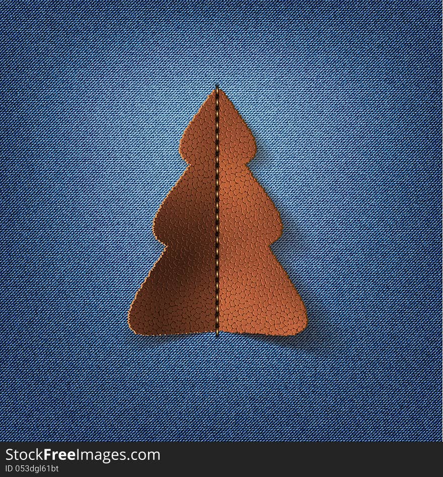 Jeans background with leather Christmas tree.