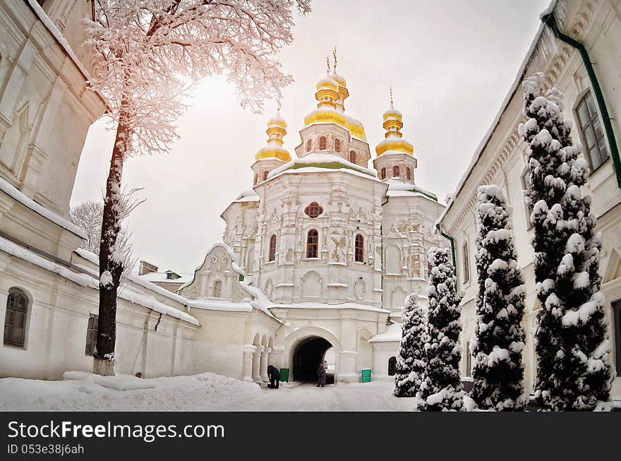 Gold domes of temples during the winter period among snow. Gold domes of temples during the winter period among snow