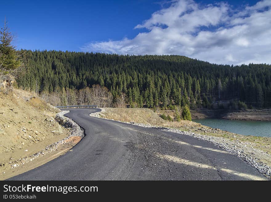 Curved road at mountain in autumn season