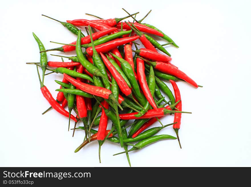 Red and green chilli  on white background.