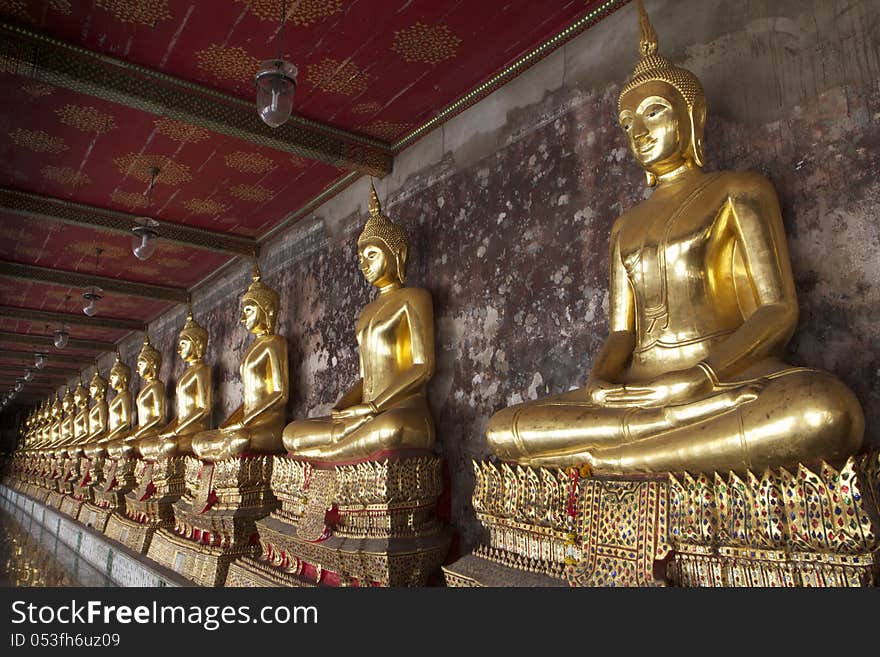 A Row of Buddha Statue in Bangkok, Thailand.