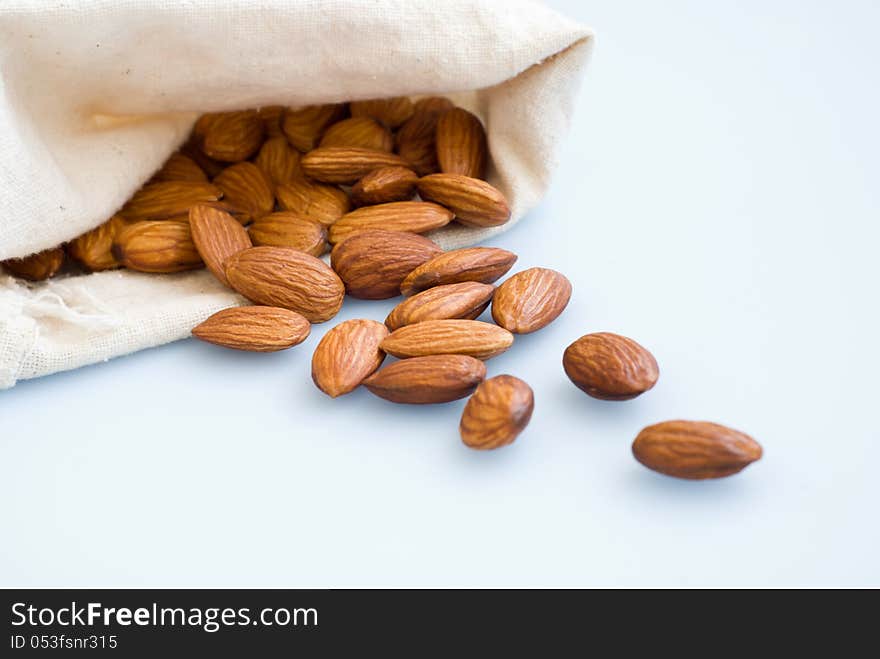 Almonds out of a off-white bag