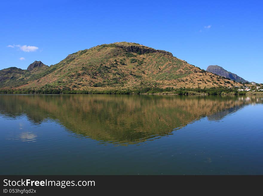 Mountain reflecting in fresh water lake, Mauritius