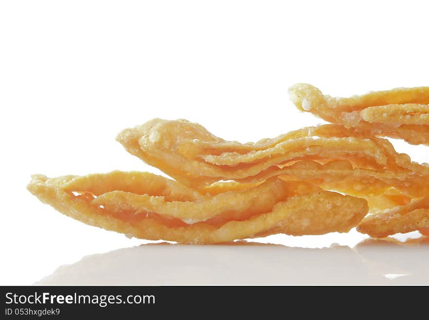 Close up weet crispy southern flat bread on white background / dessert. Close up weet crispy southern flat bread on white background / dessert