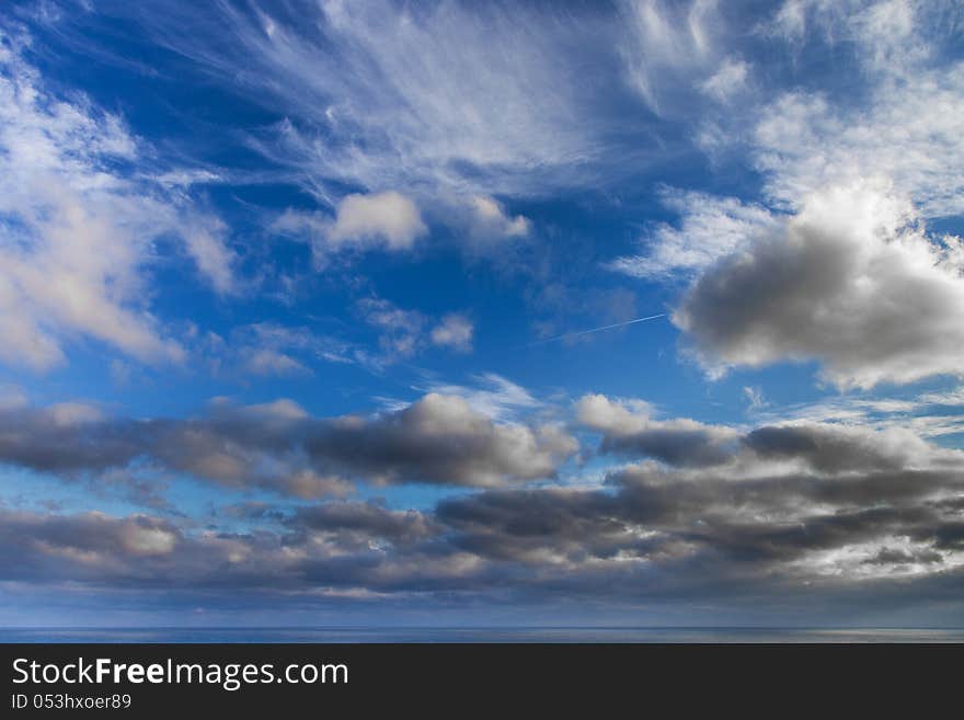 Beautiful blue sky with white clouds over the sea. Beautiful blue sky with white clouds over the sea